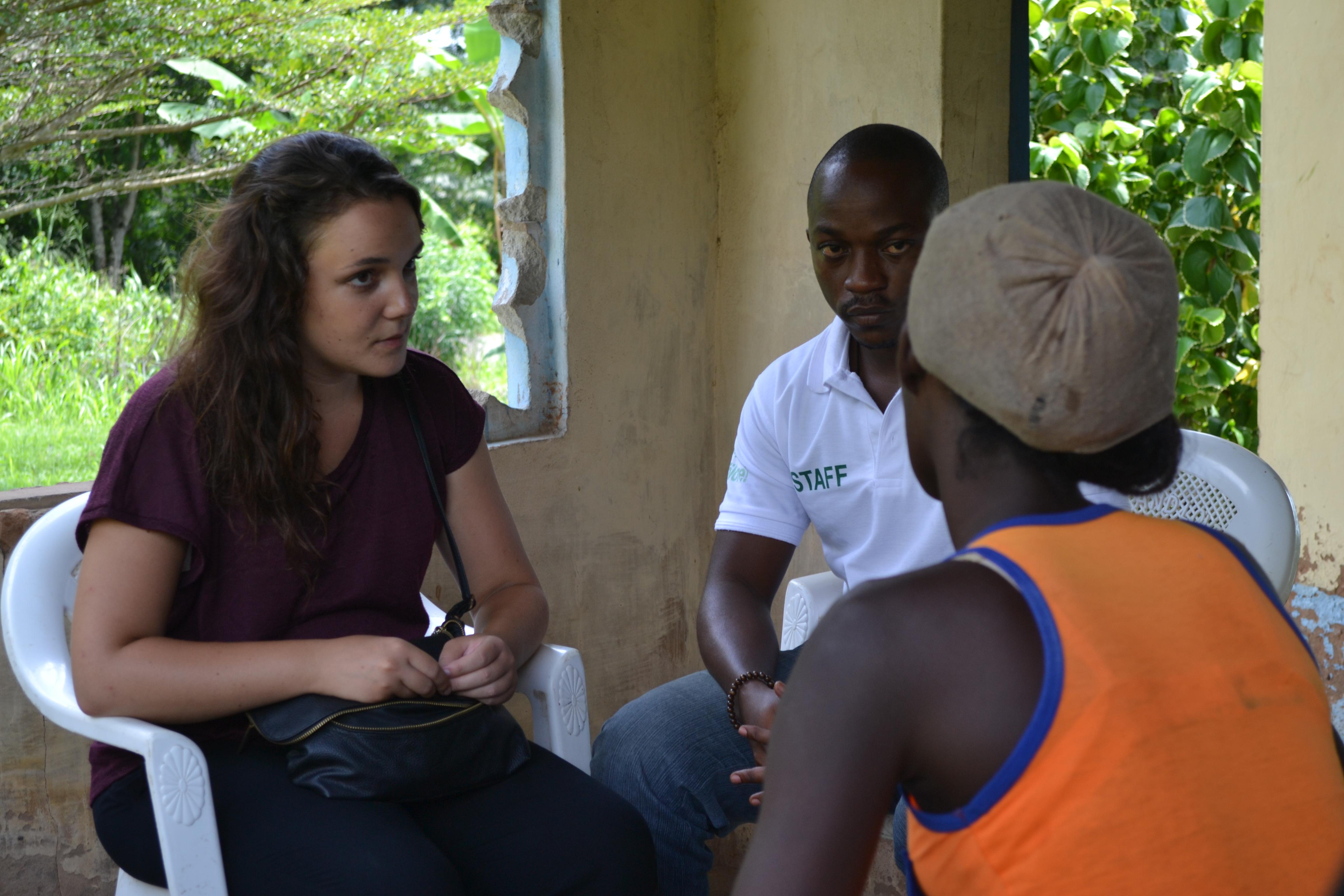 A Projects Abroad speech therapy intern in Ghana meets her patient while with a local staff member. In Ghana, a speech therapy intern and local staff member chat to a patient at the placement location.